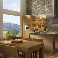 How to create a contemporary looking kitchen with panel stone veneer.
