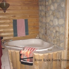 Create a mood in the bathroom with stone veneers.